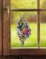 Preview: Spitzenbild Blaumeise und Blumen am Fenster