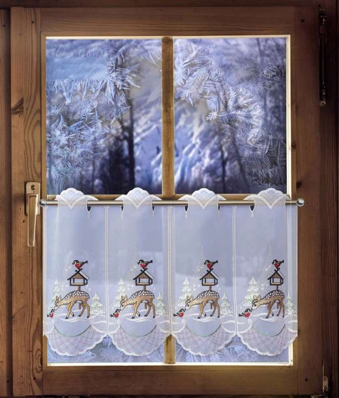 Panneaux Tier im Winter am Fenster