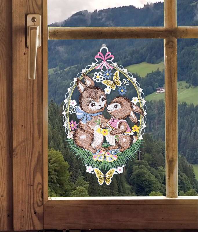 Fensterbild Hasenpaar am Fenster dekoriert