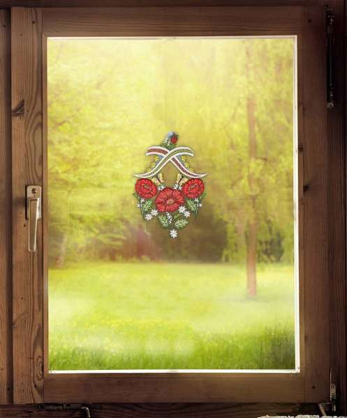 Spitzenbild mit Blumen-motiv rot am Fenster